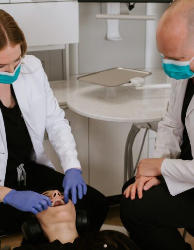 Dentists examining patient